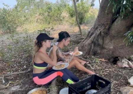 Luan Santana leva noiva para o Pantanal de MS e juntos comem carreteiro